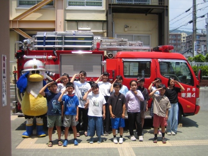 メンバーと消防車